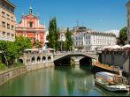 Tromostovje bridge and Ljubljana river by church in Slovenia; Shutterstock ID 124219735; Project/Title: Fodors Essential Europe Gold Guide; Destination: Essential Europe ; Downloader: Jessica Parkhill