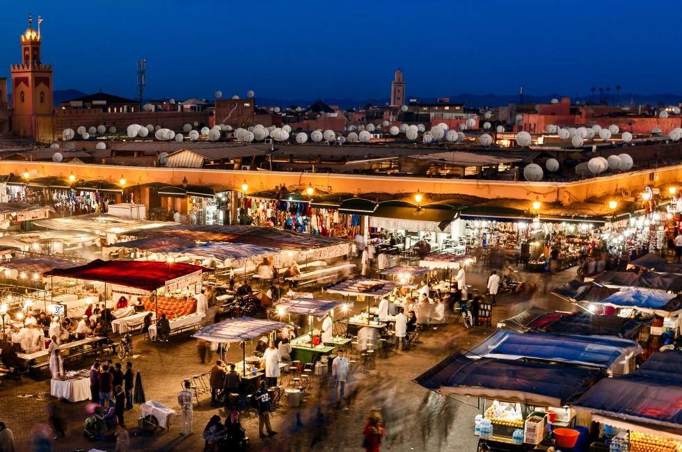 MOROCCO-DEC 24:The Night Market in the famous public square, a UNESCO site, in Marrakech, Morocco on Dec. 24, 2012. In the evening it fills with food stands, attracting crowds of locals and tourists.