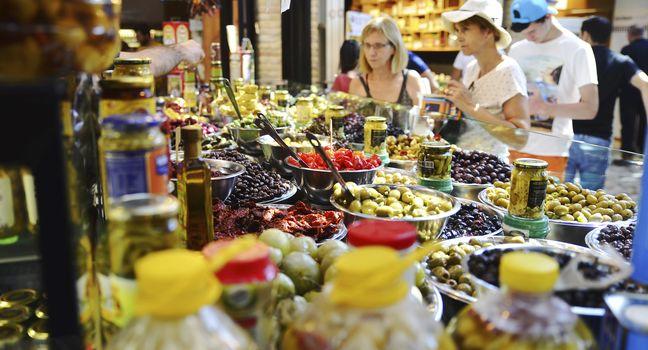 Assortment of marinated olives on stall in Sarona Gastro Market, Tel Aviv, Israel. Recently open Sarona Market became the most popular place in Tel Aviv. 29/7/2016.