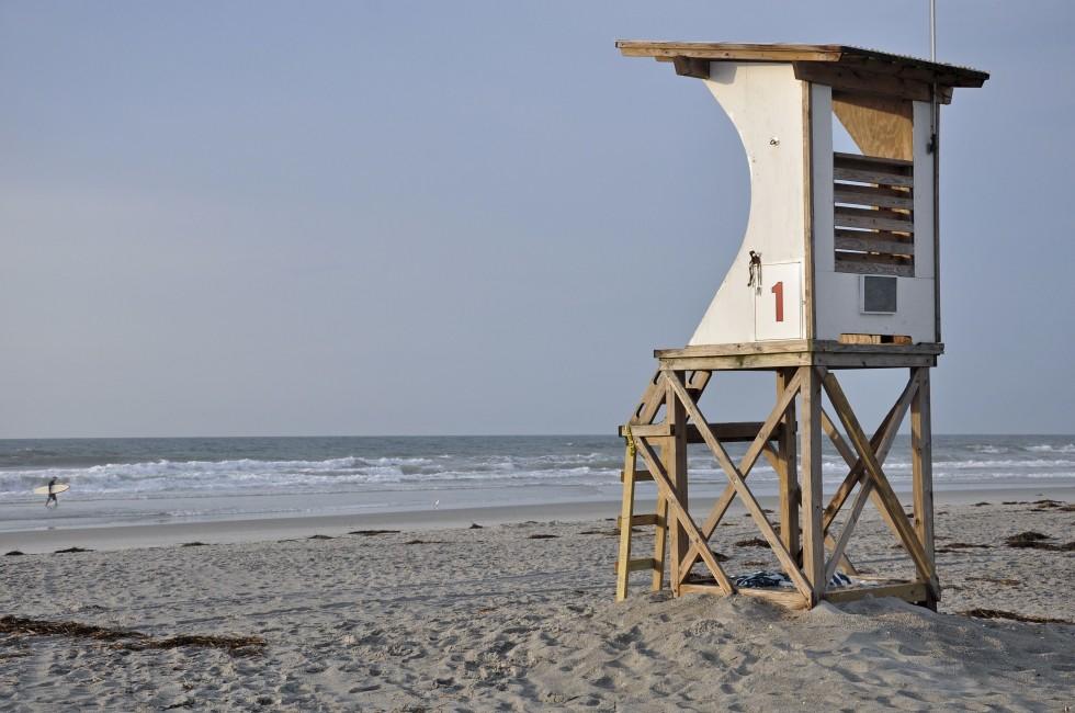 wooden lifeguard tower overlooking the Atlantic surf at Wrightsville Beach in Wilmington, North Carolina.