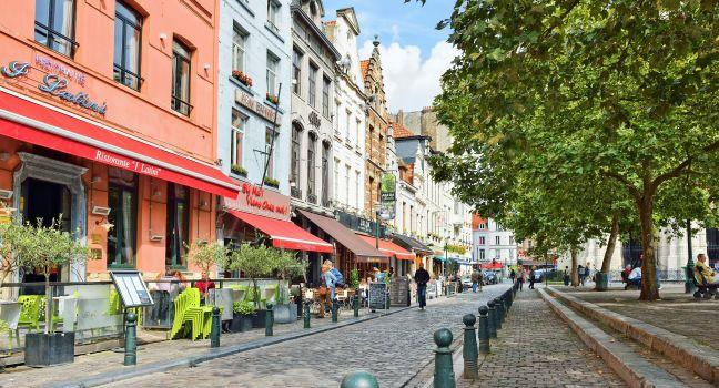 BRUSSELS, BELGIUM-AUGUST 29, 2014: Place Saint Catherine, which was built on place of the old port. This square is a favorite place for tourists searching Belgian sea food restaurants.