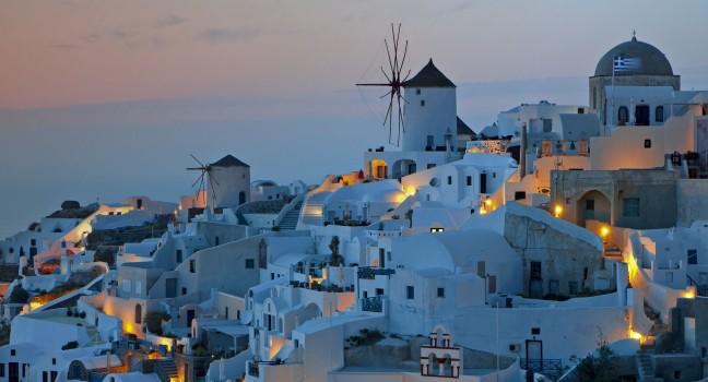 After sunset hour at Oia village of Santorini island in the  Cyclades, aegean sea, Greece.