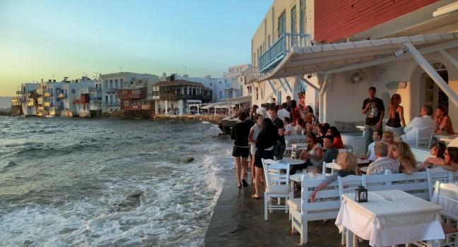 MYKONOS, GREECE - JUNE 29: Little Venice seaside on June 29, 2012 in Mykonos, Greece. Here the buildings have been constructed right on the sea's edge with their balconies overhanging the water. 