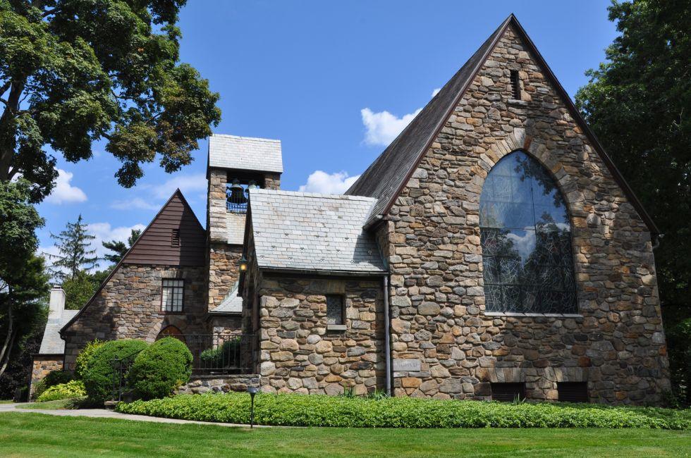 POCANTICO HILLS, NY - AUG 16: Union Church of Pocantico Hills in New York State, on Aug 16, 2013. It was built by John D. Rockefeller, Jr. and is listed in the National Register of Historic Places.; 