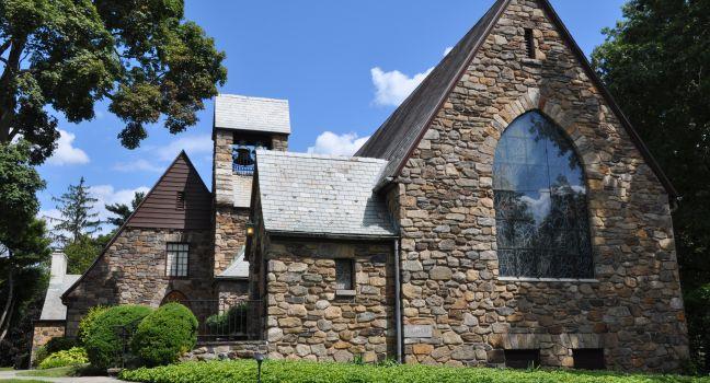 POCANTICO HILLS, NY - AUG 16: Union Church of Pocantico Hills in New York State, on Aug 16, 2013. It was built by John D. Rockefeller, Jr. and is listed in the National Register of Historic Places.; 