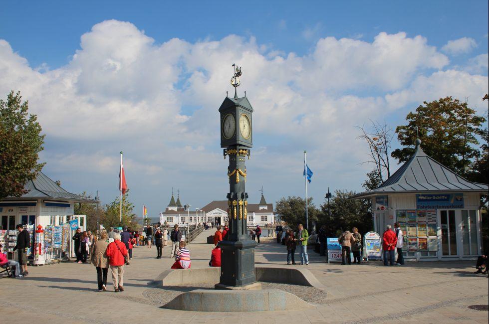 Famous square with clock by the beach of Ahlbeck on Usedom island,Baltic Sea,Germany. Typical white architecture famous for the touristic parts of the former German East.