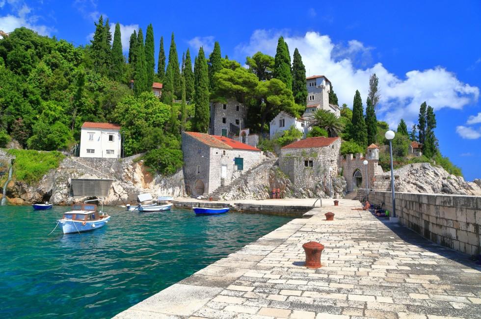 Stone pier of a small harbor near the Adriatic sea, Trsteno, Croatia