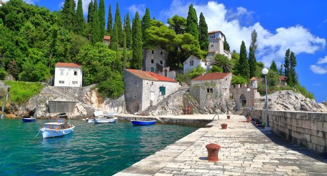Stone pier of a small harbor near the Adriatic sea, Trsteno, Croatia