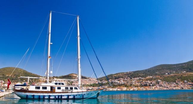 Yacht in a sea by Mediterranean beach. Samos Island, Greece; 