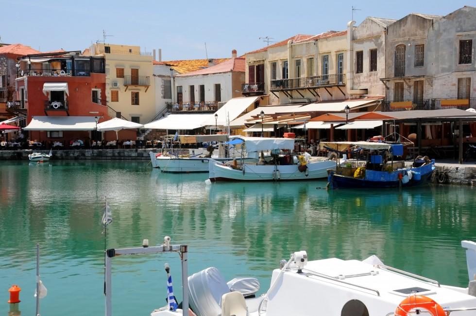 Boats and restaurants in the old Venetian port of Rethymno on Crete island in Greece; Shutterstock ID 63949324; Project/Title: Silversea; Downloader: Fodor's Travel