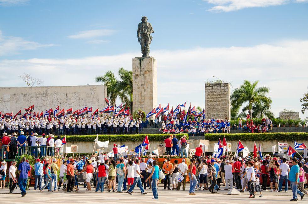 SANTA CLARA, CUBA-MAY 1, 2012:  Cubans march in celebration of the May Day International Worker's Day according to Communist Countries. This event is government sponsored and it happens every year; Shutterstock ID 199849301; Project/Title: Fodor's Cuba; Do