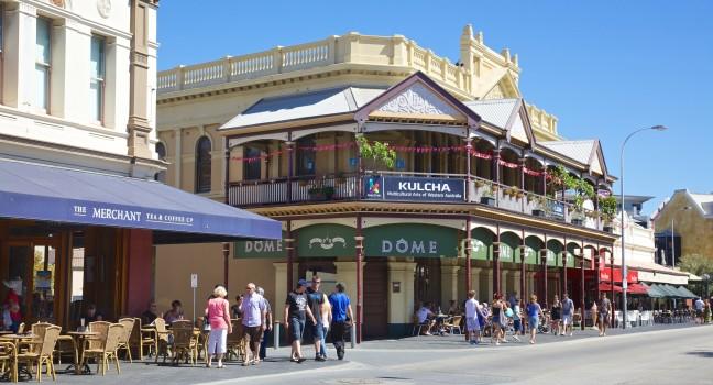 FREMANTLE, AUSTRALIA - APRIL 3, 2011: Shoppers and tourists in Fremantle's 'Cappuccino Strip', an area jam-packed with lively restaurants, historical pubs, small funky bars and micro breweries.; 