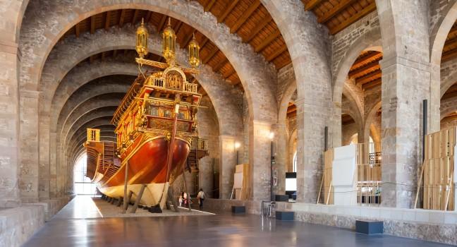 Imitation of war medieval ship in Museu Maritim de Barcelona in June 1, 2013 in Barcelona, Spain.  Museum was opened in 1929 and is located in shipyards, built in 1283.