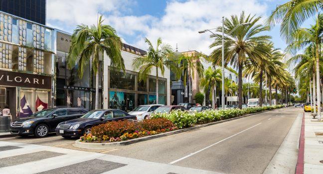 BEVERLY HILLS, CA - SEP 20: Rodeo Drive in Beverly Hills on September 20, 2013. Rodeo Drive is an affluent shopping district known for designer label and haute couture fashion.