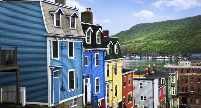 Street with colorful houses near ocean in St. John's, Newfoundland, Canada; 