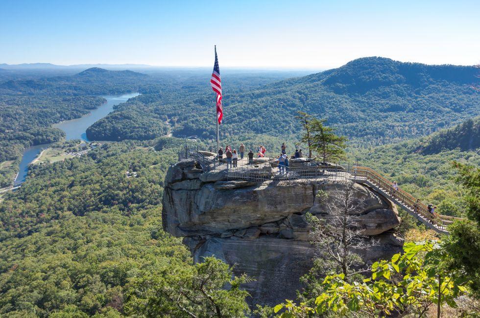 Chimney Rock, NC, USA - October 17: Chimney Rock State Park with Lake Lure in the background on October, 17, 2014 in Chimney Rock, NC, USA.