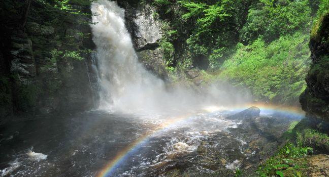 Bushkill waterfall with rainbow in Poconos , PA