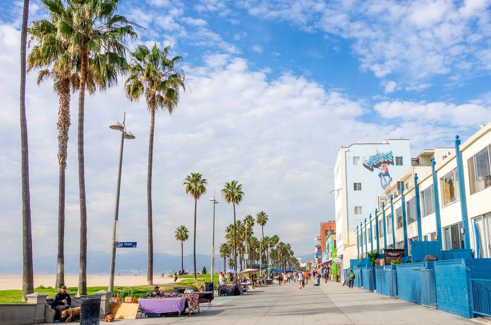 VENICE,CA - DECEMBER 18, 2013: Ocean Front Walk of Venice Beach in Venice, US. This boardwalk is 2.5 kilometer long