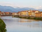 River Arno floating through the medieval city of Pisa.; 