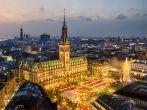 Aerial view of the City Hall with the Christmas market in Hamburg, Germany.