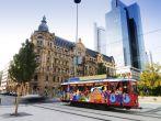 A colorful electric tram or train in Frankfurt