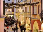 BRESSANONE BRIXEN, ITALY: DECEMBER 8, 2014: Traditional Christmas time, with scenic winter view and tourists of the Old Town in Bressanone Brixen on December 8, 2014
