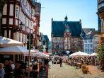 MARBURG, GERMANY-JULY 07, 2013: Market square with historical Town Hall in University City of Marburg, Germany.
