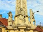 Votive column detail from baroque period in Pozega main square, Croatia.