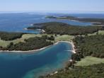 National park Brijuni  are a group of fourteen small islands in the Croatia part of the northern Adriatic Sea , bay Verige with old Roman monuments - aerial view