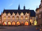 The town hall of Goslar, Lower Saxony, at dusk, market square, arcades in 1450, Old Town, a UNESCO world heritage.