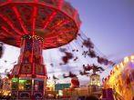 MUNICH - OCTOBER 4: An illuminated chairoplane is attracting visitors at the Oktoberfest fair ground in Munich on October 4, 2010 in Munich, Germany.; Shutterstock ID 128113910; Project/Title: AARP; Downloader: Melanie Marin