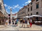DUBROVNIK, CROATIA - JULY 19: Old town of Dubrovnik (Stari grad) with sightseeing tourists on the limestone paved Stradun street, on July 19, 2014 in Dubrovnik, Croatia.