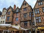 TOURS - JUNE 12: Half-timbered houses dating from the XV century on Plumereau Square, famous of bustling weekly markets and fairs in Tours, France on June 12, 2012; 