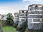 Chateau d'Angers - castle in city of Angers in Loire Valley (department Maine-et-Loire) in France. Castle is located on a rocky ridge overhanging river Maine, founded in 9th century by Counts of Anjou; 