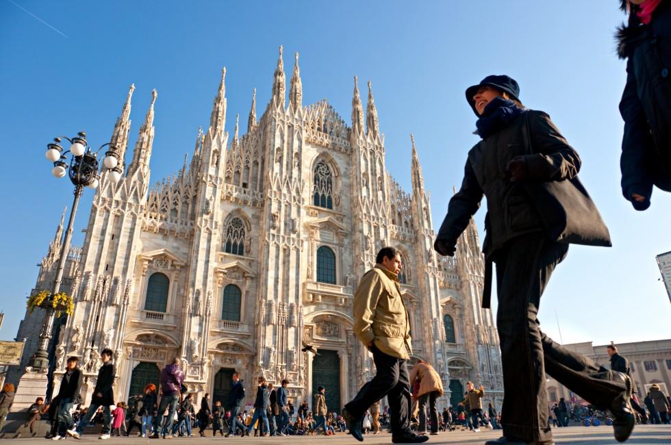 MILAN - DECEMBER 11: Tourists at Piazza Duomo on December 11, 2009 in Milan, Italy. As of 2006, Milan was the 42nd most visited city worldwide, with 1.9 million annual international visitors 