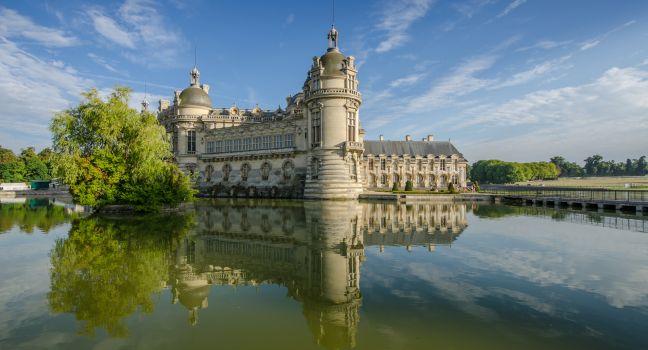 CHANTILLY, FRANCE 23 AUG: view of Chantilly castle of France on 23 August 2013. It is a historic castle located in the town of Chantilly.  It houses the Museum of Conde