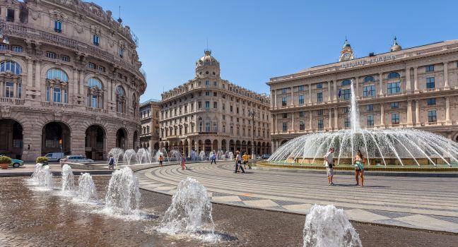 GENOA, ITALY - JUNE 30, 2012: Piazza de Ferrari - city main square, situated between historical and modern center, famous for it's fountain and is financial and business heart of Genoa, Italy.