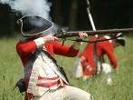 English Redcoat Soldier Firing Weapon.