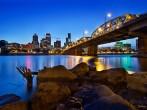 Portland Oregon City Skyline along Willamette River at Blue Hour.