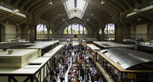 SAO PAULO, BRAZIL - CIRCA MARCH 14: Municipal Market (Mercado Municipal) in Sao Paulo. More than 1,500 people works together to handle about 450 tons of food per day in its more than 290 boxes.; 