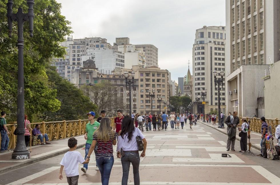 SAO PAULO, BRAZIL - MAY 29: Unidentified People walk in Santa Efigenia viaduct on May 29, 2013 in Sao Paulo, Brazil. Santa Ifigenia Viaduct is located in downtown with exclusive use for pedestrians.; 