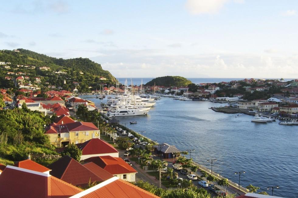 ST BARTS, FRENCH WEST INDIES - JANUARY 12:Aerial view at Gustavia Harbor with mega yachts on January 12, 2004 in St Barts. The island is popular tourist destination during the winter holiday season 