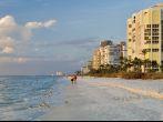 florida gulf coast beach at naples in late afternoon; 