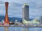 KOBE, JAPAN - JULY 12: Kobe Port Tower and Maritime Museum stand as symbols of prosperity in Meriken Park on July 12, 2011 in Kobe, Japan.