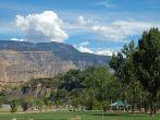 Municipal park by the Colorado River in Palisade, Colorado with the Grand Mesa in the background.