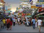 Bangkok, Thailand - June 7, 2007: Tourists and Thais walk on Khao San Road, a short pedestrian street in the Banglamphu area of Bangkok popular with backpackers and other visitors.