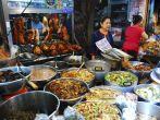 BANGKOK, THAILAND - JANUARY 31: Unidentified female cook variety food at Yaowarat Road in Bangkok's Chinatown district on January 31, 2011 in Bangkok, Thailand; Shutterstock ID 150790835; Project/Title: Photo Database Top 200