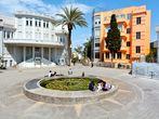 TEL AVIV - APR 10 2015:Visitors in Bialik Square in Tel Aviv, Israel. It was the home of the first city townhall with great example of Bauhaus architecture for which Tel Aviv was named the white city.