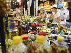 Assortment of marinated olives on stall in Sarona Gastro Market, Tel Aviv, Israel. Recently open Sarona Market became the most popular place in Tel Aviv. 29/7/2016.