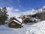 Large houses in winter mountains,  above Vail Valley,Colorado;